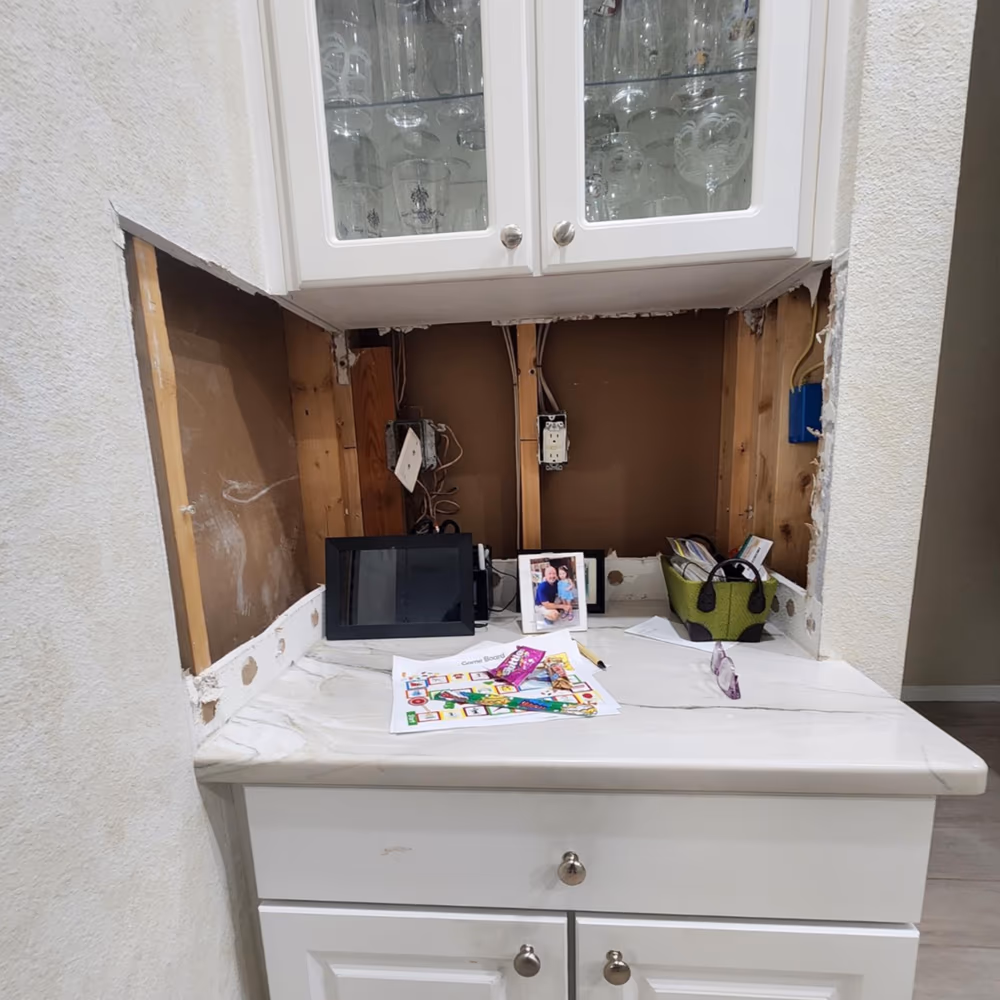 Kitchen nook opened to the studs before repair