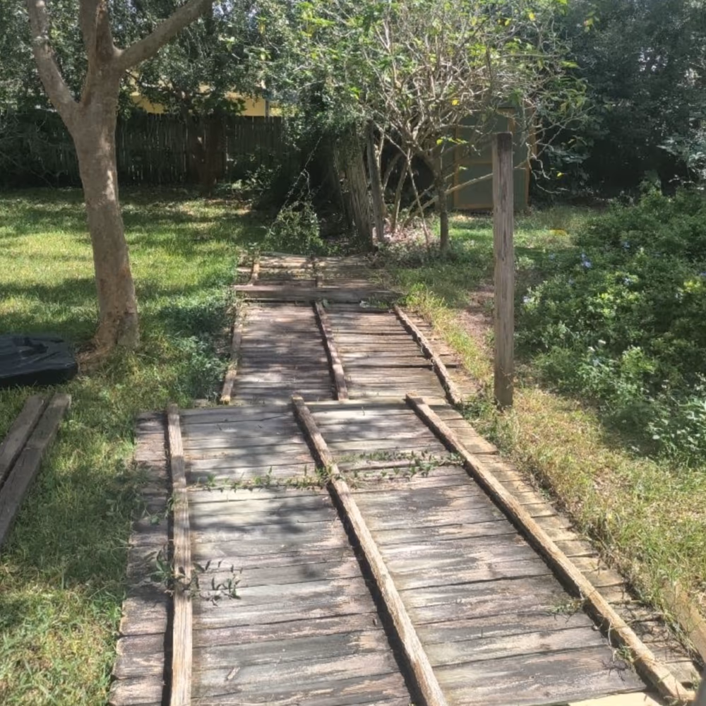 Damaged fence before replacement