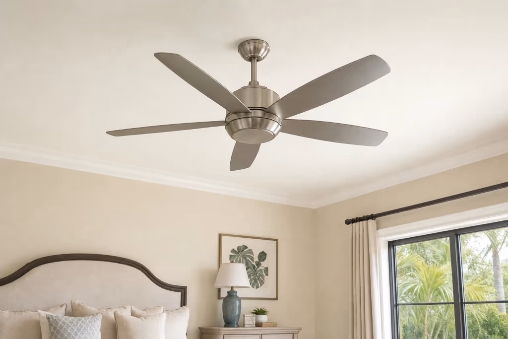 Newly installed five-blade ceiling fan centered on a clean bedroom ceiling in an upscale Florida home