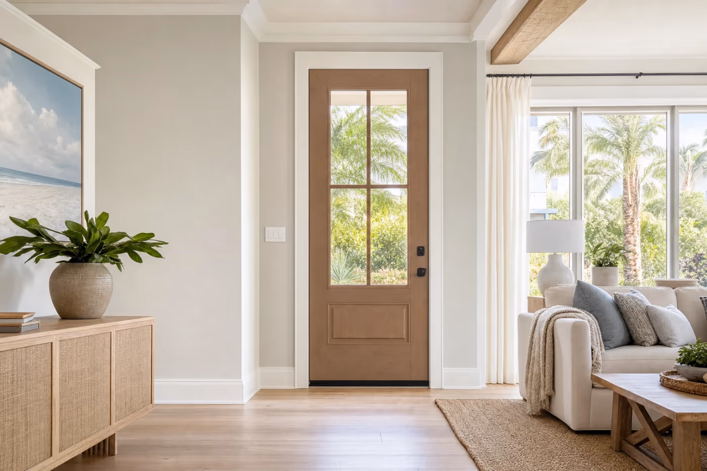 Wide view of a Florida living room with a beautifully installed entry door as the clear focal point