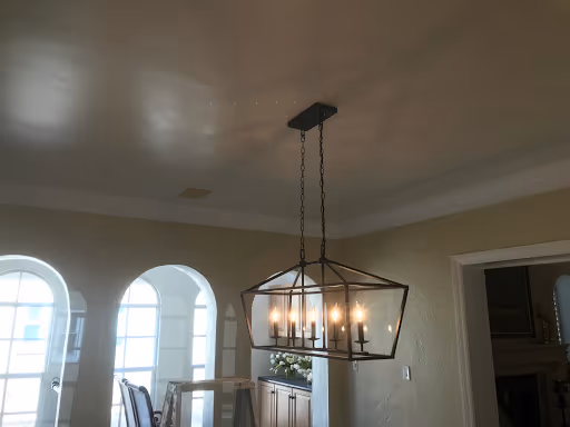 Ceiling repaired, refinished, and repainted after leak damage